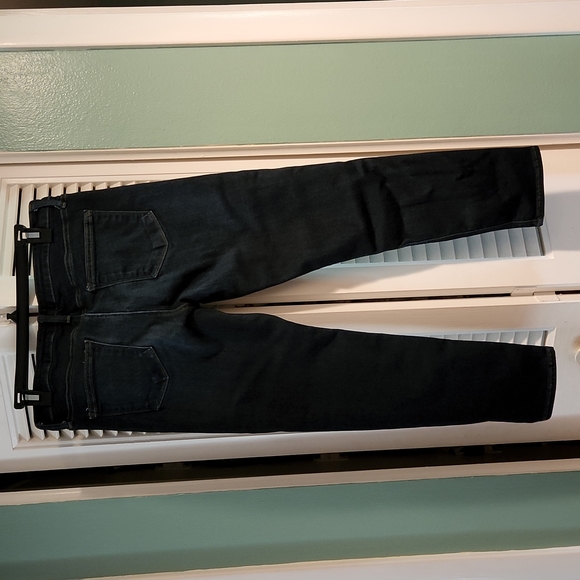 Dark bue jeans w/small slit at ankle. - Picture 6 of 7